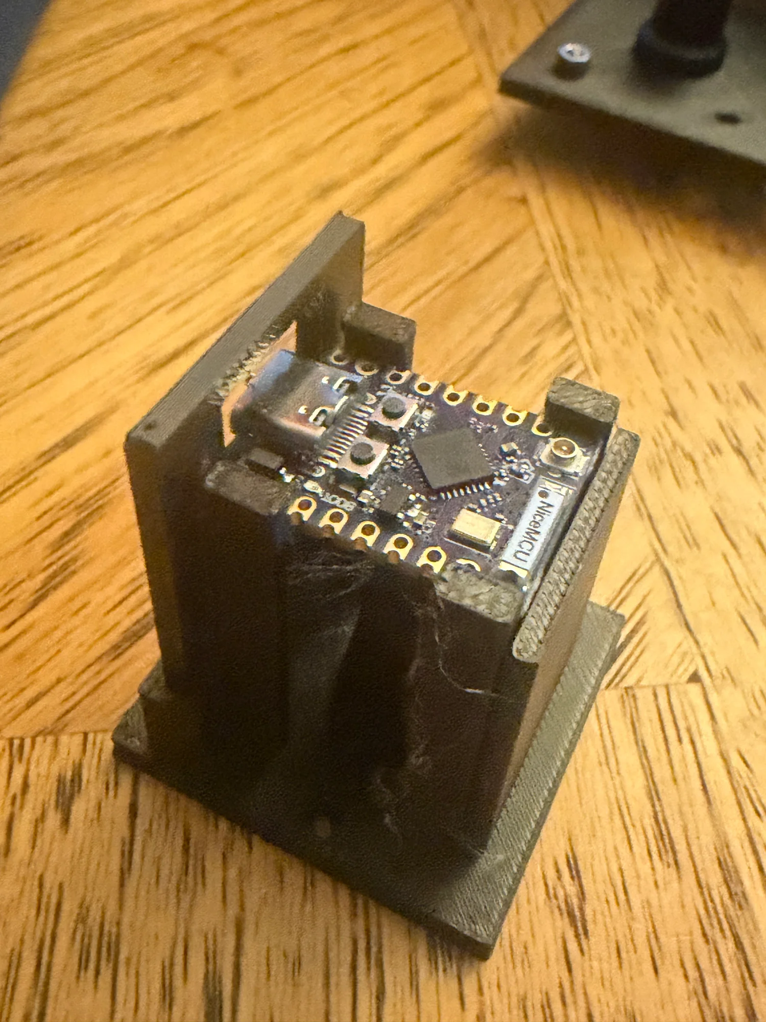 The early ESP32 holder being checked with the actual board.